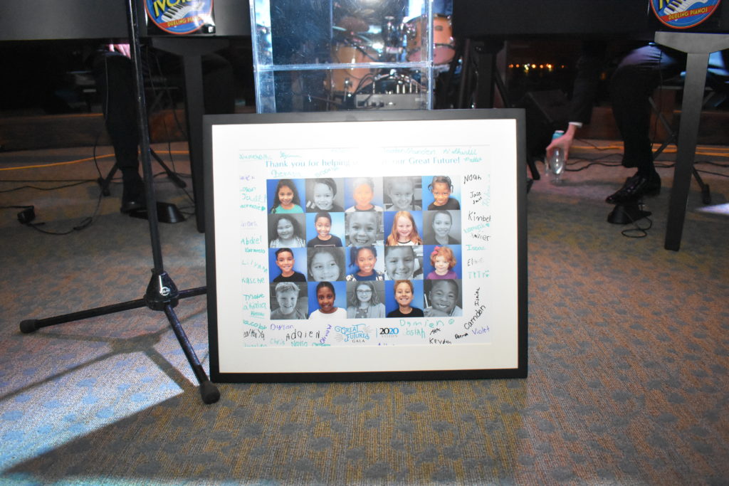 framed and signed picture of children