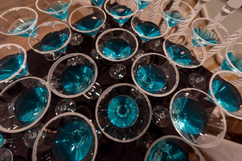 blue cocktail drinks on a tray